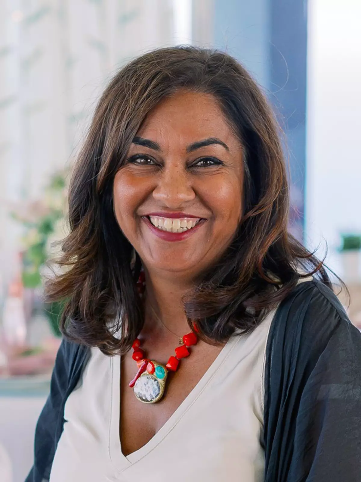 Monica Coumbe, from Hour Weddings, headshot.